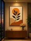 Handmade tufted botanical wall hanging with cream background, mustard-orange sun, green leaves, and terracotta shapes
