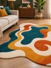 Retro wave tufted rug with rust, mustard and teal waves beside a cream sofa